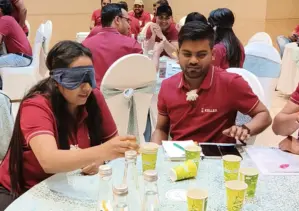 Team-building activity with blindfolded challenge